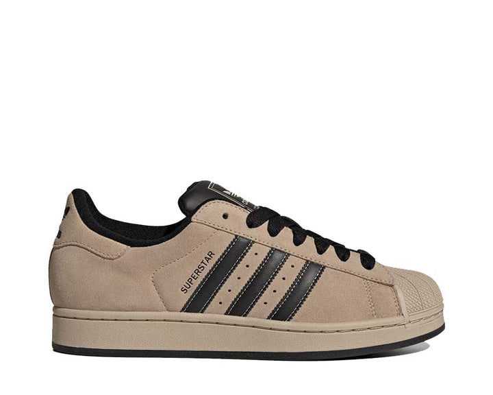 Sneakersy skórzane w kolorze khaki z ikonicznym designem na muszlę