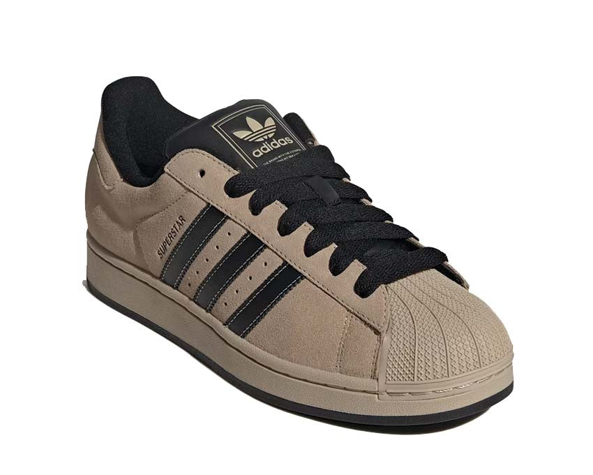 Sneakersy skórzane w kolorze khaki z ikonicznym designem na muszlę