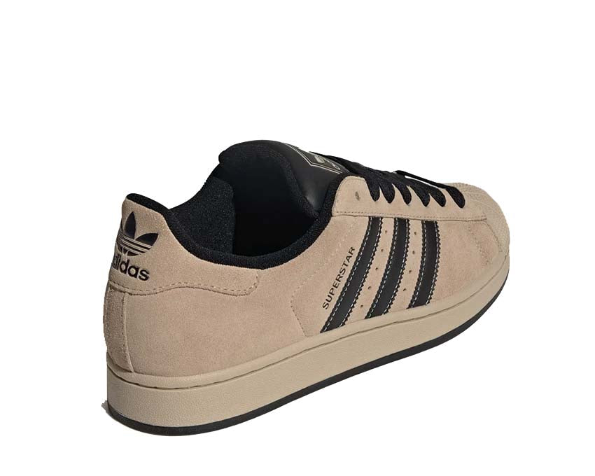 Sneakersy skórzane w kolorze khaki z ikonicznym designem na muszlę