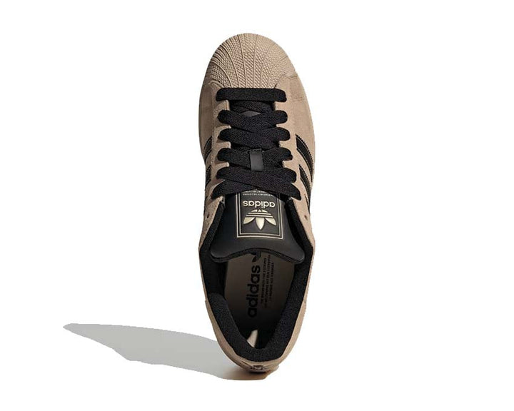 Sneakersy skórzane w kolorze khaki z ikonicznym designem na muszlę