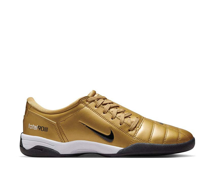 Buty piłkarskie z syntetycznej skóry w kolorze metalicznego złota.